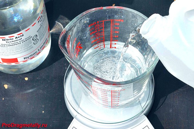 Distilled water in a measuring cup